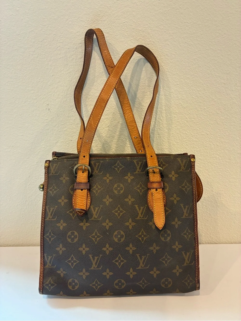 LOUIS VUITTON POPINCOURT HANDBAG.